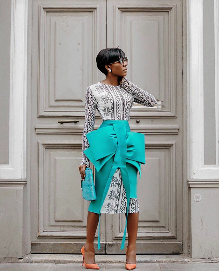 Og okonkwo wearing style temple structured bow skirt