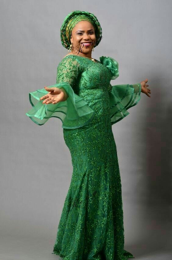 Green lace gown with organza 