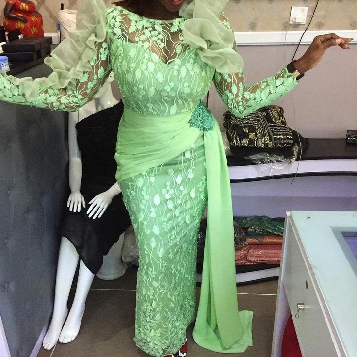 Lace gown aso ebi