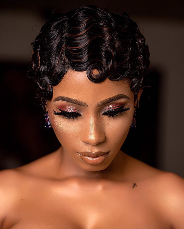 Mercy eke pin curls hairstyle