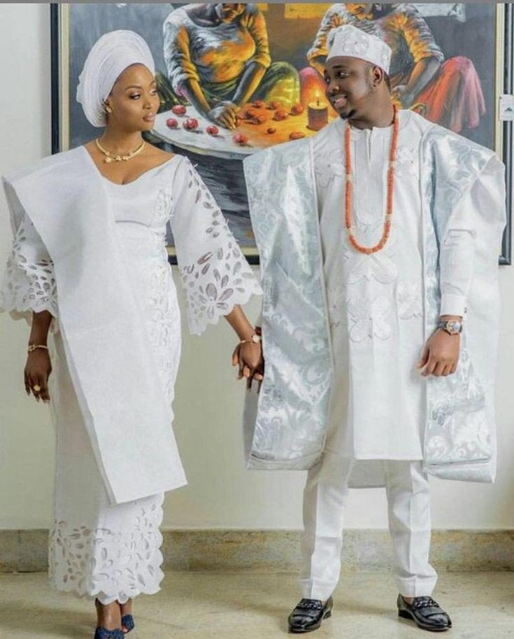Pure white aso oke with cut out design