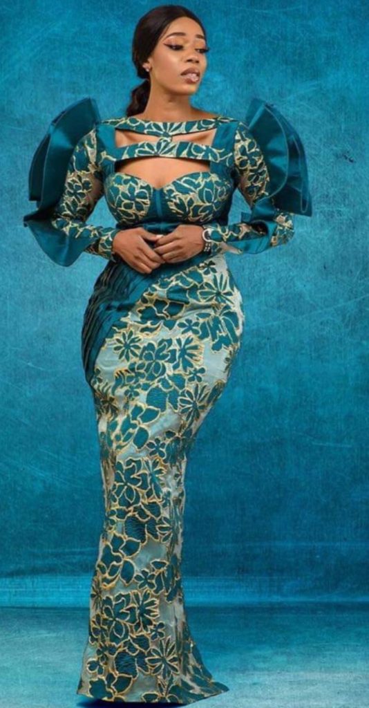 Emerald green brocade dress with puff sleeve